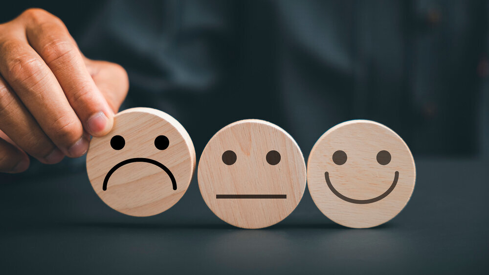 Smiley mit nach unten gehenden Mundwinkeln