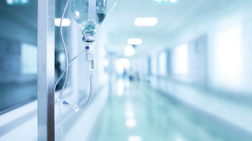 Medical drip in hospital corridor, concept of treatment