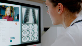 Caucasian female doctor delivering telemedicine consultation to a patient. Telehealth, telemedicine, remote consultation service. Coronavirus, COVID-19