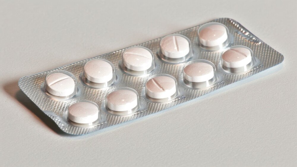 Antipyretics: Medications like acetaminophen and ibuprofen are used to reduce fever by lowering the hypothalamus's set point temperature, close-up --chaos 15 --ar 16:9 --stylize 150 --v 6 Job ID: 77b6e577-064d-451b-8567-fe4c12f247c8