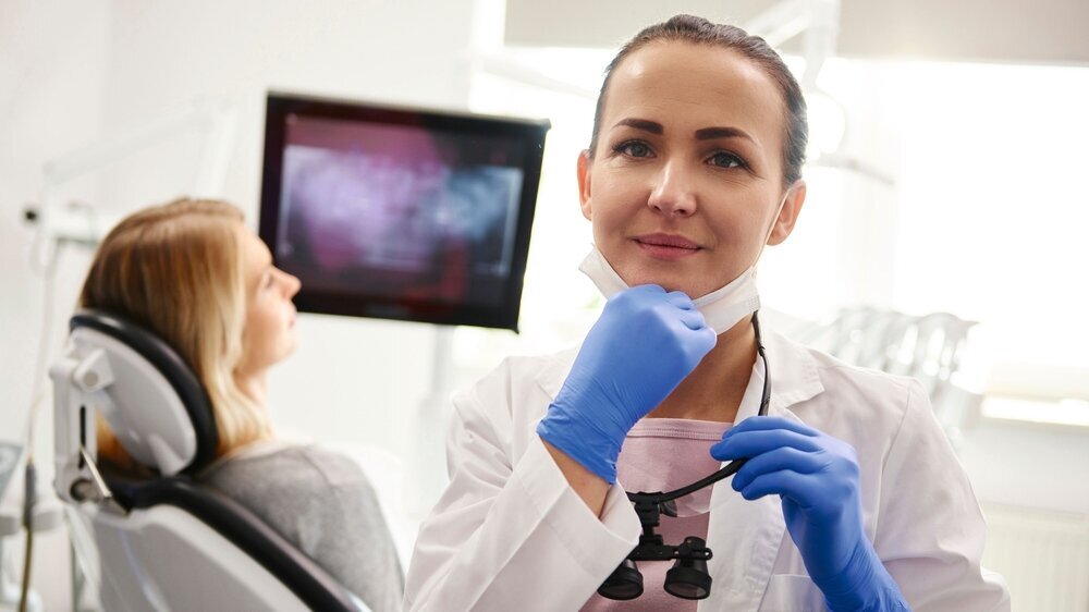 Portrait of female dentist preparing for the job Portrait of female dentist preparing for the job