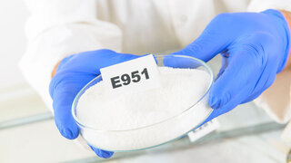 Researcher presenting preservatives substances that are added to products such as foods, pharmaceuticals, paints, biological samples, wood etc.