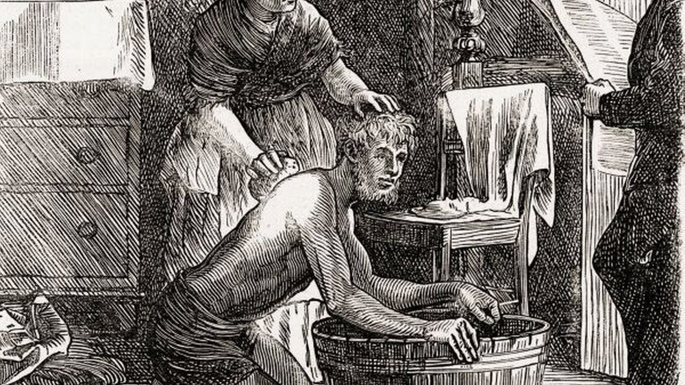 Waschaktion nach getaner Arbeit um 1871 in Northumberland, England. Das Wasser kam aus der Pumpe draußen, die Reinigung erfolgte im Wohnzimmer. |