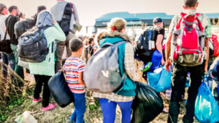 The refugees migrate to Europe. blurred, bokeh background, defocused