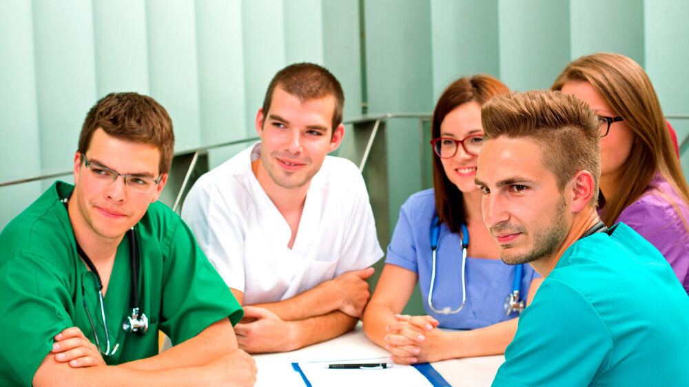 Medical team Pflegekräfte im Meeting