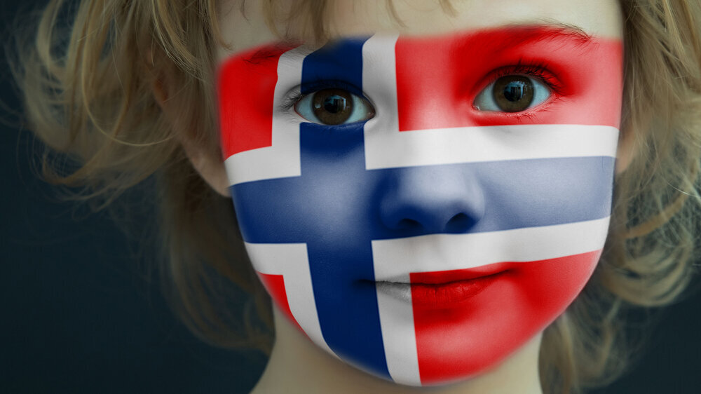 Portrait of a child with a painted Norwegian flag Kind Norwegen