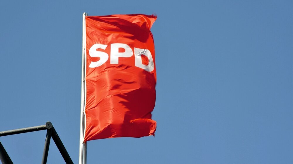 Berlin / Germany - May 9, 2016: Banner of Social Democratic Party of Germany - SPD - blows on the roof of the party headquarters , Berlin, Germany SPD-Flagge