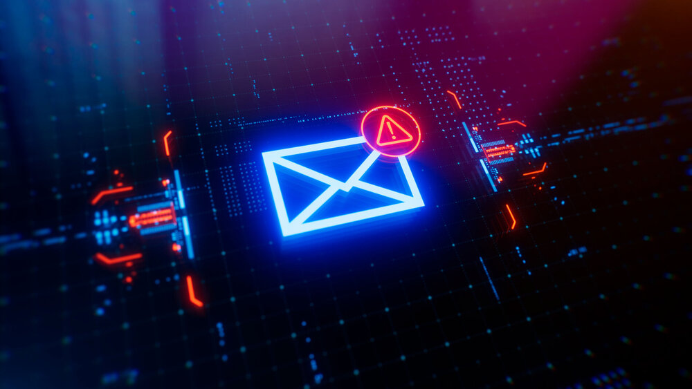 Message with warning icon on a digital LCD display with reflection. Concept of cyber attack, malware, data breach, system hacking, virus, spyware, compromised information and urgent attention.
