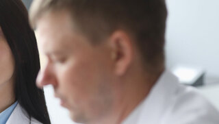 Woman dissatisfied doctor distrust looks at her colleague portrait. Incorrect treatment concept