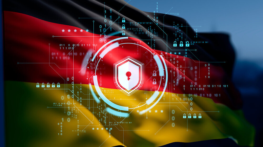 Digital shield and lock hologram over waving Germany flag, futuristic HUD style on dark background, concept of cybersecurity and data protection, 3D Rendering