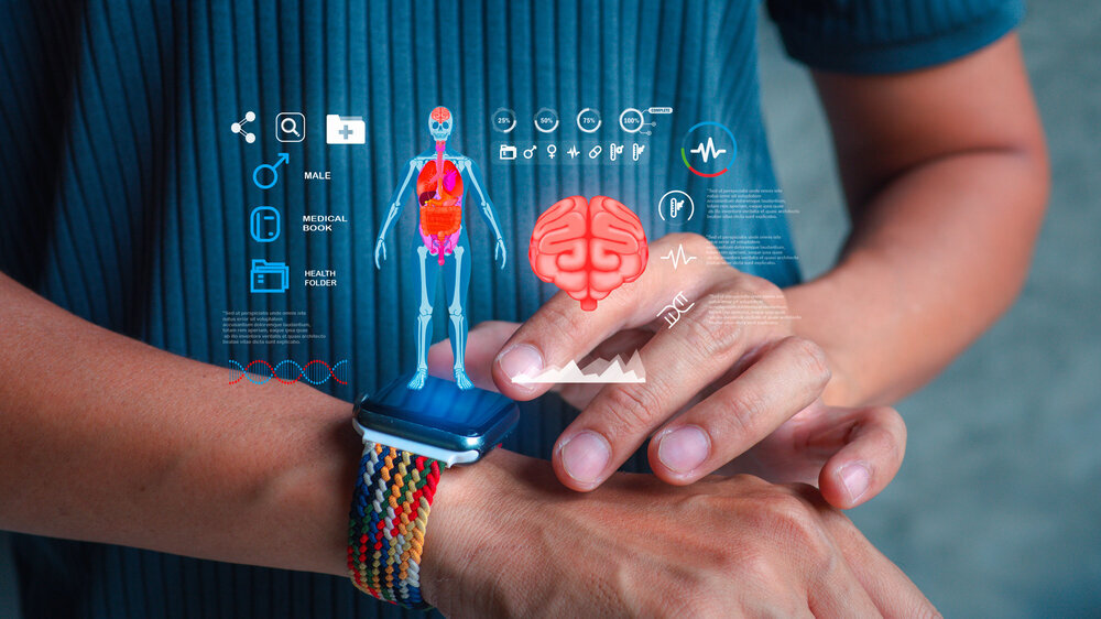 Man using a smartwatch with holographic projection of human body and brain. Concept of AI healthcare, smart wearable technology, and medical innovation.