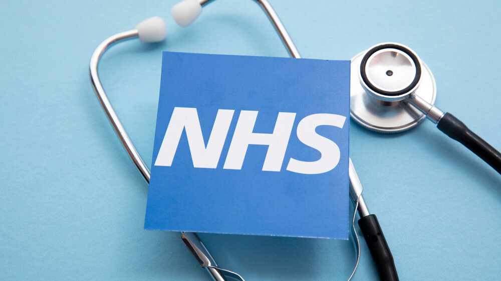 NHS Logo mit Stethoskop NHS Logo mit Stethoskop