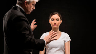 Alternative medicine therapist using hypnosis to heal his patient