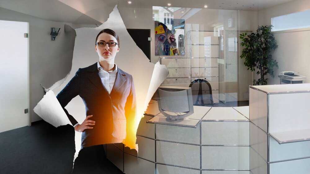 Effect of torn paper hole A hole in a sheet of paper with businesswoman