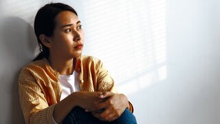 Depressed young asian woman with mental health problem in mind need crucial treatment from overthinking fatigue girl, disruptive thought, dissocial, anxiety and mental health disorders.