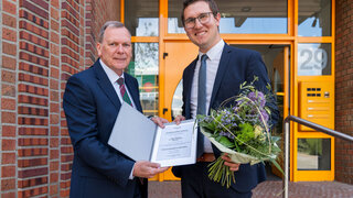 Dr. Fabian Zurnieden (re.) und Leslie Crawford vom OGI-Vorstand.