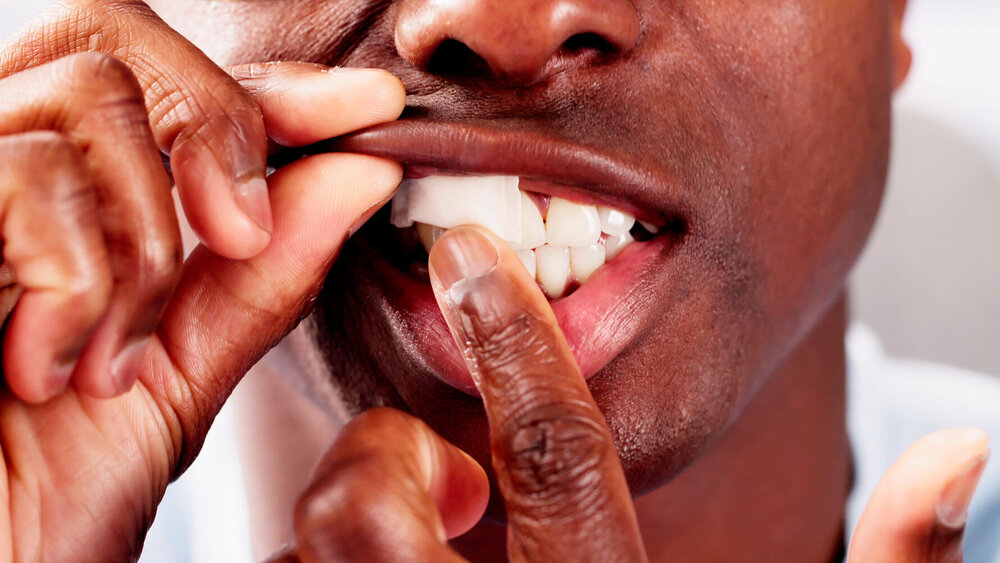 Man Chewing Wet Moist Nicotine Tobacco Snus Product