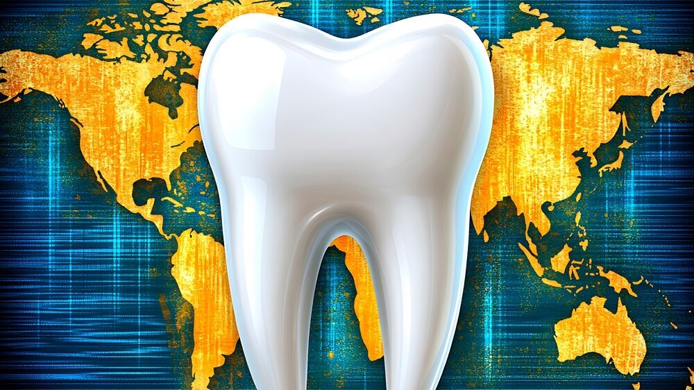 A Tooth Is Placed In Front Of A World Map On a Blue Background Zahnmedizin weltweit