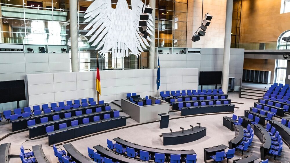 BERLIN, GERMANY - SEPTEMBER 20, 2017: Interior of Plenary Hall (meeting room) of German Parliament (Deutscher Bundestag). Building and Meeting room available for public between plenary sessions BERLIN, GERMANY - SEPTEMBER 20, 2017: Interior of Plenary Hall (meeting room) of German Parliament (Deutscher Bundestag). Building and Meeting room available for public between plenary sessions