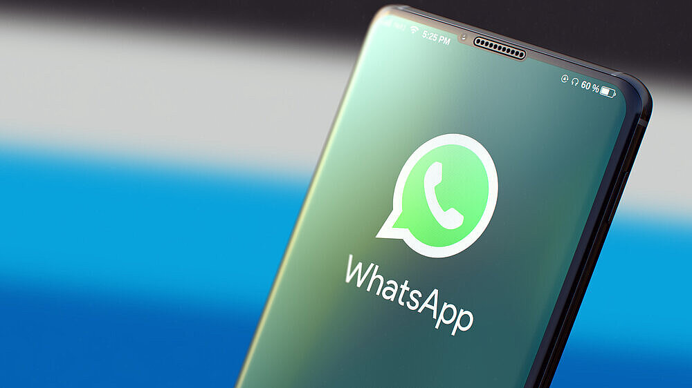 Messenger-Dienst WhatsApp auf einem Handydisplay. Messenger-Dienst WhatsApp auf einem Handydisplay.