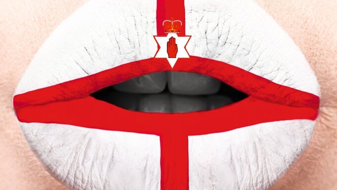 Female lips close up with a picture flag of Northern Ireland. white, red. Nordirland Munf