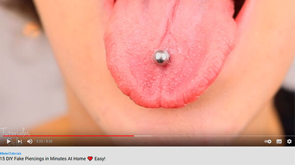Bei der kritisierten "Challenge" auf TikTok werden Minimagneten ober- und unterhalb der Zunge so platziert, dass sie ein Piercing simulieren. Schon länger liefern Influencer Videoanleitungen dazu, wie man sich Metallkugeln an die Zunge klebt.