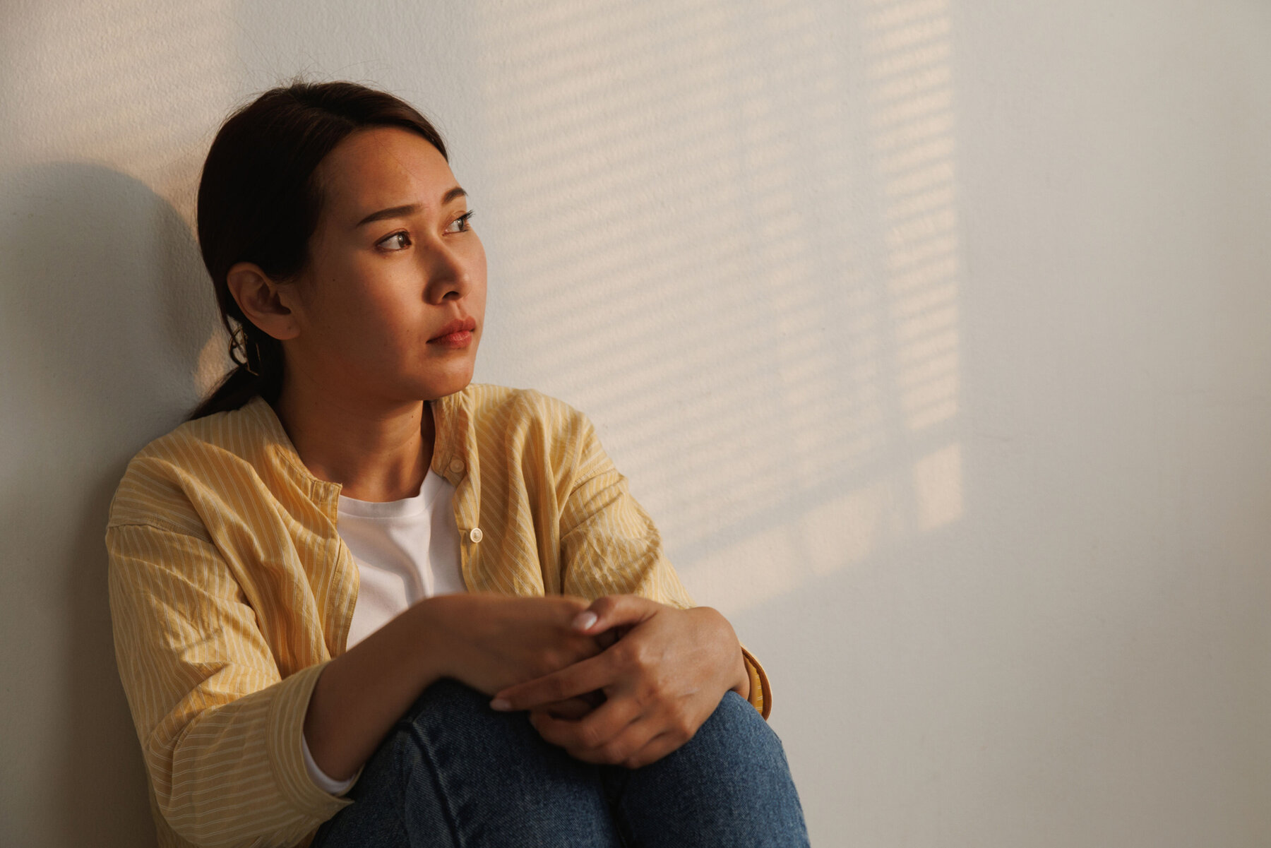 580242-flexible-1900.jpg Depressed young asian woman with mental health problem in mind need crucial treatment from overthinking fatigue girl, disruptive thought, dissocial, anxiety and mental health disorders.