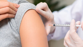 Health care, corona virus, hand of woman nurse, doctor giving syringe vaccine, injection dose on arm sick patient at clinic. Vaccination, immunization disease prevention against flu pandemic influenza