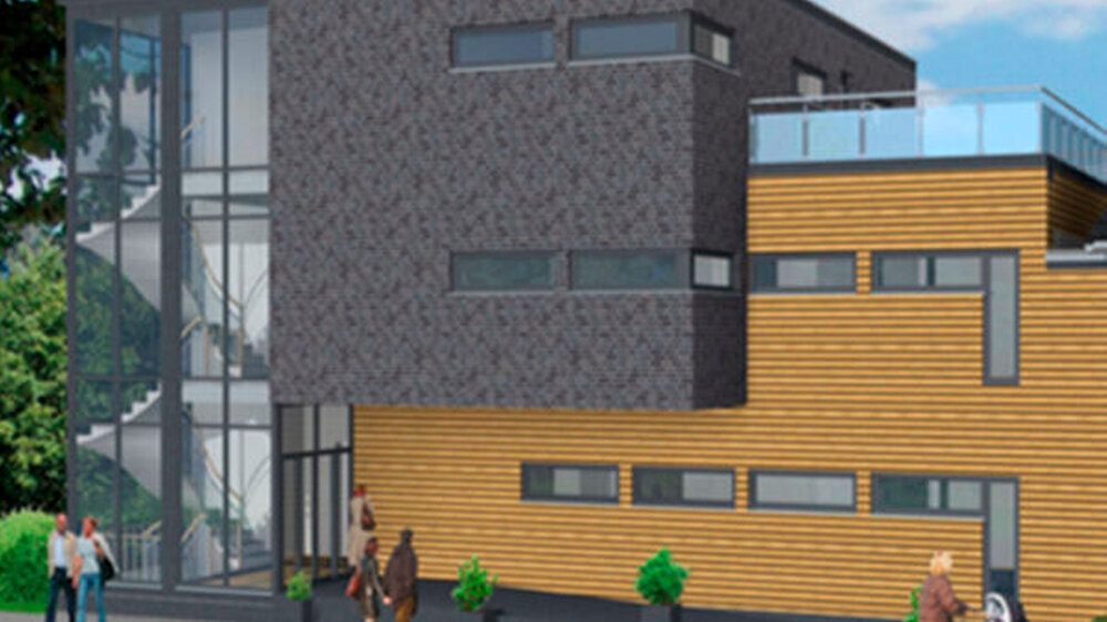 Unser Versuch für ein Staffelgeschoss: Hier haben wir uns selber Gedanken zum Gebäude gemacht. Der integrierte Kubus dienst im Außenbereich als Überdachung der Rampe und gewinnt zum Nachbargebäude eine große Terrasse. Der Anschluss zum Nachbargebäu