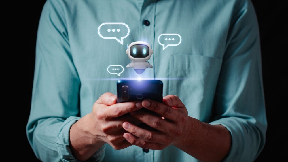 Person using a smartphone to interact with a friendly AI chatbot, and digital chatbot are assistant conversation for provide access to data growth of business in online network. Person using a smartphone to interact with a friendly AI chatbot, and digital chatbot are assistant conversation for provide access to data growth of business in online network.