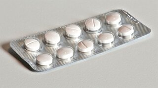 Antipyretics: Medications like acetaminophen and ibuprofen are used to reduce fever by lowering the hypothalamus's set point temperature, close-up --chaos 15 --ar 16:9 --stylize 150 --v 6 Job ID: 77b6e577-064d-451b-8567-fe4c12f247c8