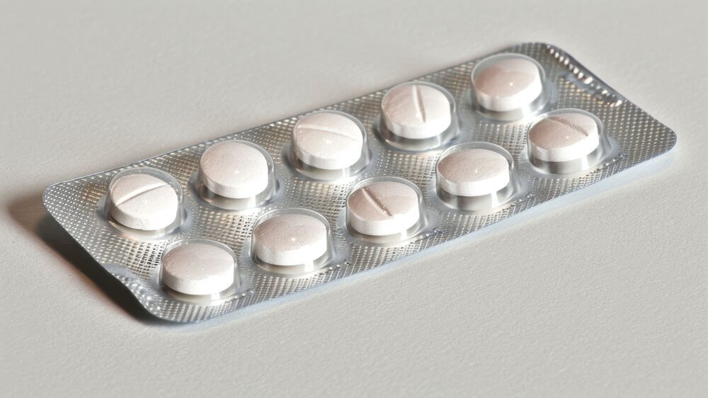 Antipyretics: Medications like acetaminophen and ibuprofen are used to reduce fever by lowering the hypothalamus's set point temperature, close-up --chaos 15 --ar 16:9 --stylize 150 --v 6 Job ID: 77b6e577-064d-451b-8567-fe4c12f247c8