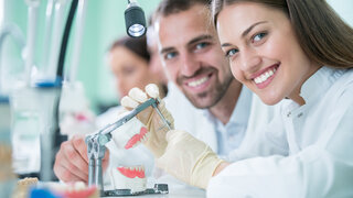 Future dentists, mentors and health technicans in training, concept